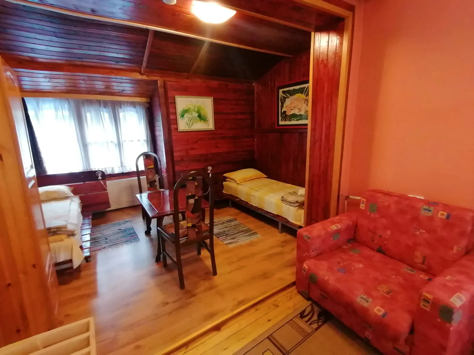 A corner with a sofa and a table